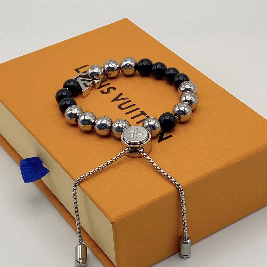 13420885188395146 Louis Vuitton Beaded Onyx & Silver Bracelet with LV Charm - Image 1