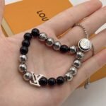 Louis Vuitton Beaded Onyx & Silver Bracelet with LV Charm - Image 6