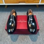 Ferragamo Black Glossy Patent Leather Round Emblem Metal Buckle Slip-On Men Luxury Formal Loafer Shoes