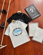 Prada Oval Frame Blue Letter Print Crew Neck Cotton Loose Short Sleeve T-shirt 2 Colors