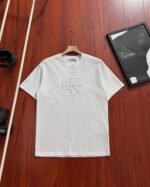 Calvin Klein Embossed Letter Logo Crew Neck Loose Cotton Short Sleeve T-shirt 4 Colors - Image 5