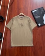 Calvin Klein Embossed Letter Logo Crew Neck Loose Cotton Short Sleeve T-shirt 4 Colors - Image 4