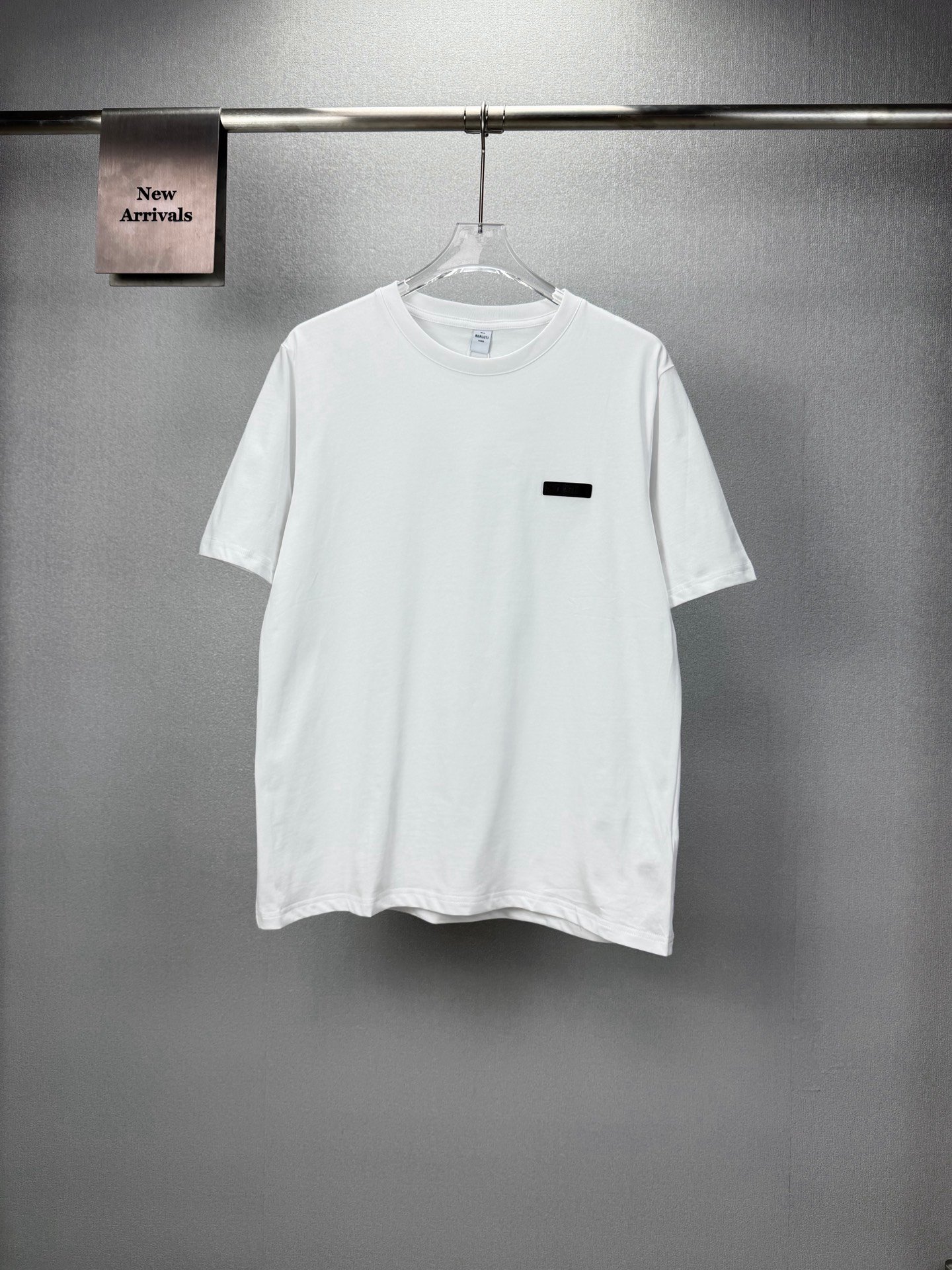 26070816-Berluti-Tee-1 Berluti Solid White Crew Neck Minimalist Black Label Patch Short Sleeve T-Shirt - Image 1