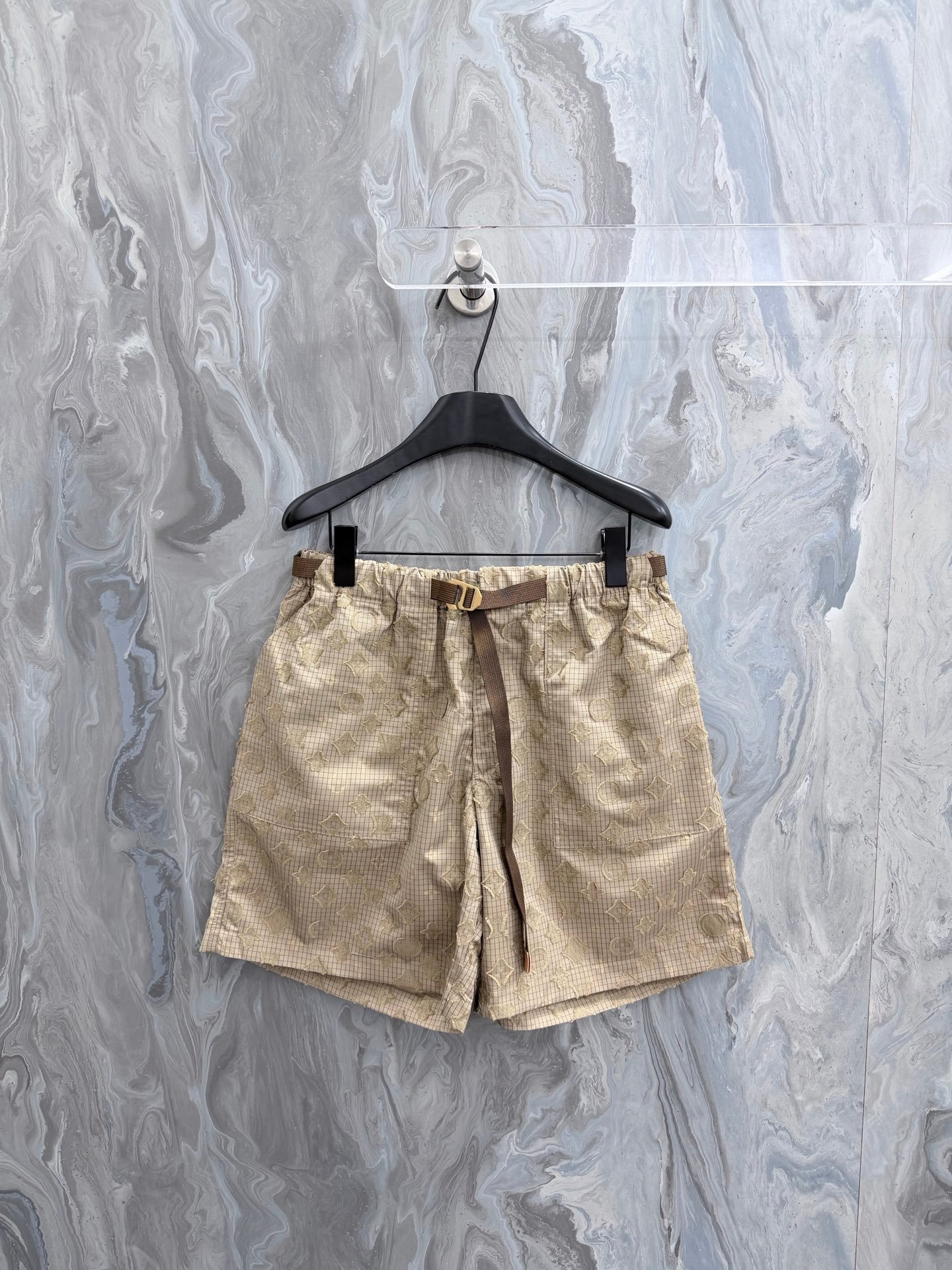 26070911-LV-Drawstring-Short-01 Louis Vuitton Khaki Grid Fabric Embossed Symbol Shorts Adjustable Buckle Belt Casual Vacation Short Pants - Image 1