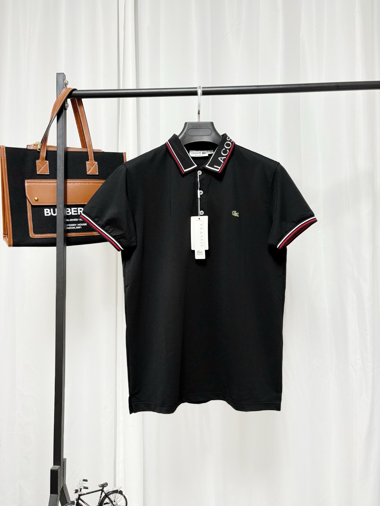 26071302-Lacoste-Polo-Black-1 Lacoste Black Short‑Sleeve Polo Shirt Striped Collar And Cuff Small Embroidery Logo Business Casual Tee - Image 1