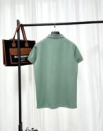 Lacoste Sage Green Short‑Sleeve Polo Shirt Striped Collar And Cuff Small Embroidery Logo Business Casual Tee - Image 2