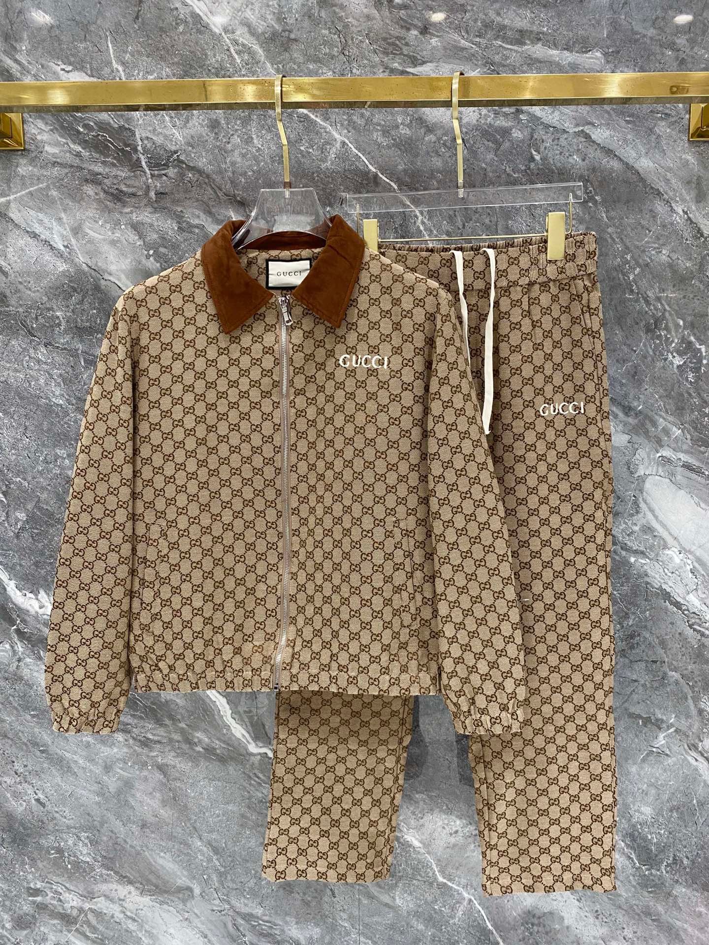 26081601-Gucci-Outfit-110 Gucci Men Khaki All‑Over Monogram Jacquard Suede‑Look Contrast Collar Zip‑Up Jacket & Drawstring Pants Outfit Set - Image 1