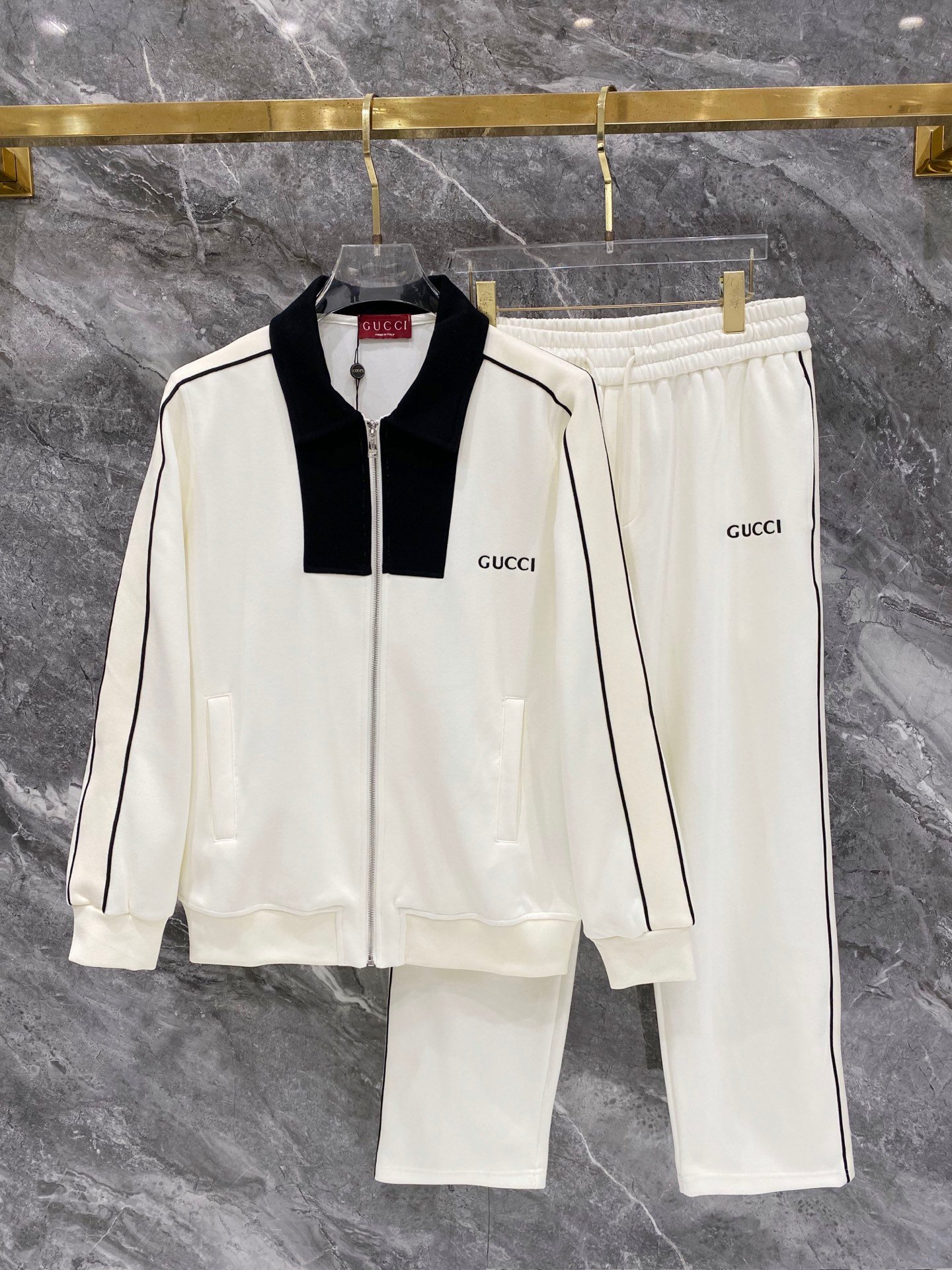 26081801-Gucci-Outfit-260-073 Gucci Men Knit Tracksuit Set Color‑Block Collar Zip‑Up Jacket + Straight‑Leg Sweatpants 2pcs Outfit - Image 1