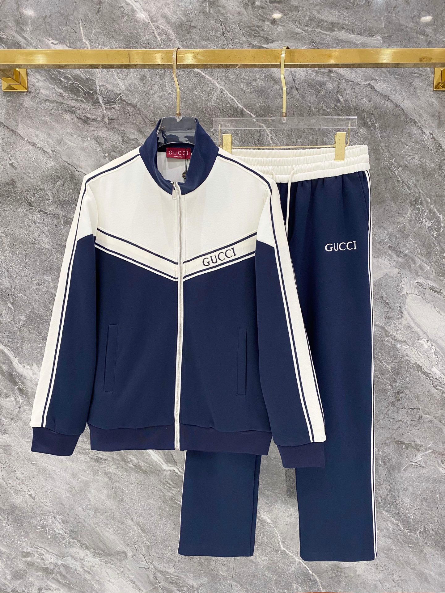 26081801-Gucci-Outfit-260-110 Gucci Men Knit Tracksuit Set Color‑Block Stand Collar Zip‑Up Jacket + Straight‑Leg Sweatpants 2pcs Navy Outfit - Image 1