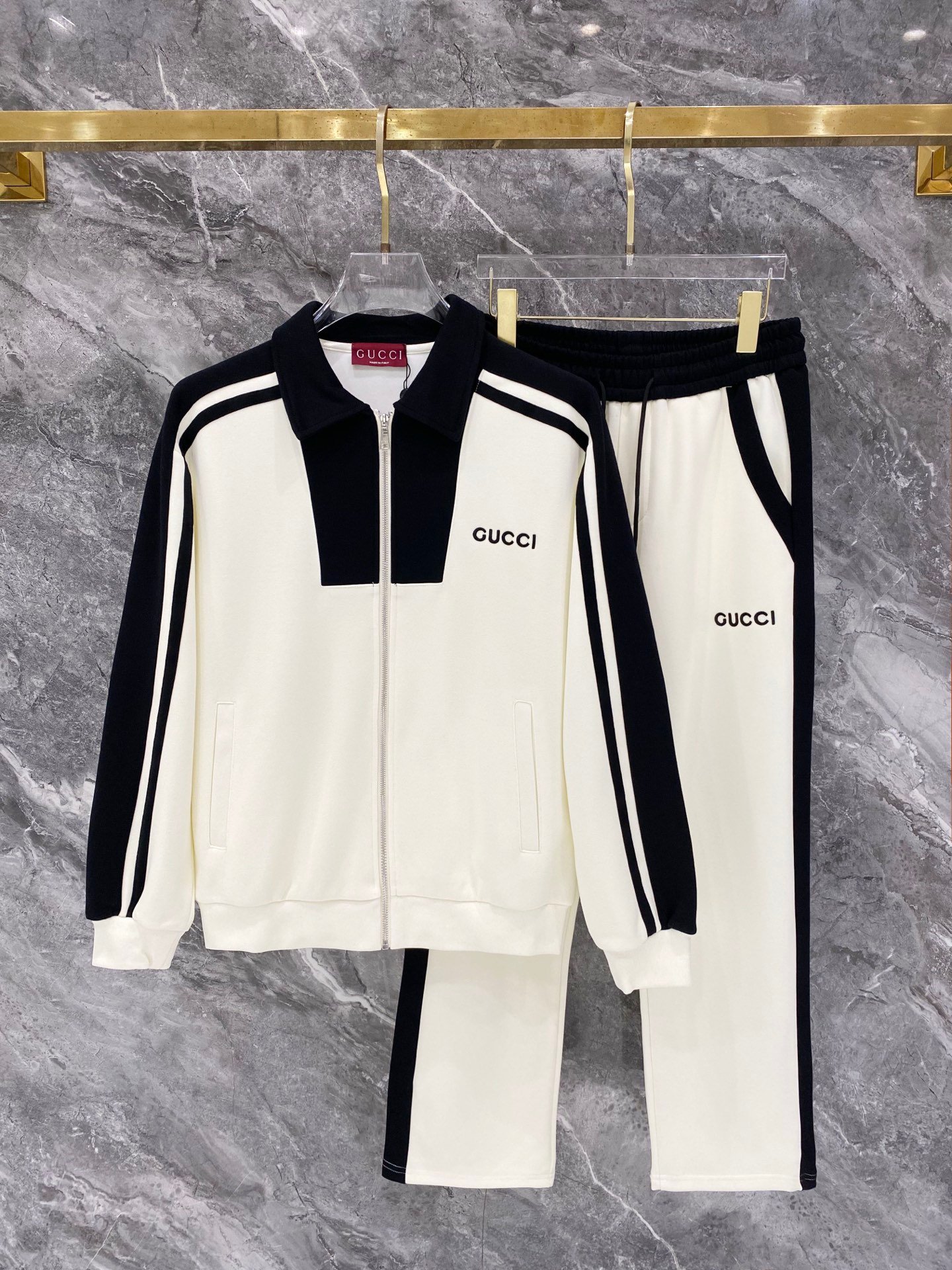 26081801-Gucci-Outfit-260-281 Gucci Men Knit Tracksuit Set Color‑Block Collar Zip‑Up Jacket Straight‑Leg Sweatpants 2pcs Off‑White‑Black Outfit - Image 1