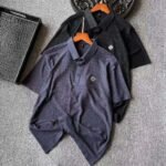 Prada Textured Waffle‑Knit Short‑Sleeve Polo Shirt Metal Clover Badge Casual Top
